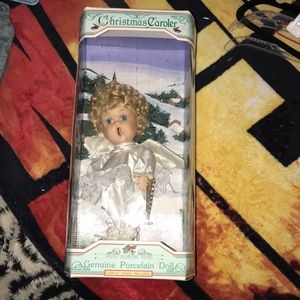 Special collectors edition genuine porcelain doll Christmas caroler NEW